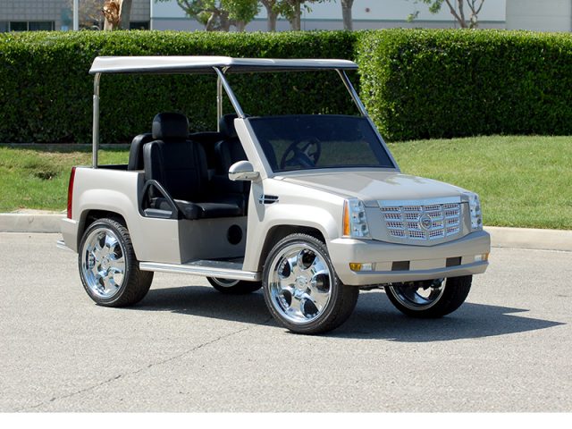 Silver Escalade Golf Cart With Roof and Custom Wheels