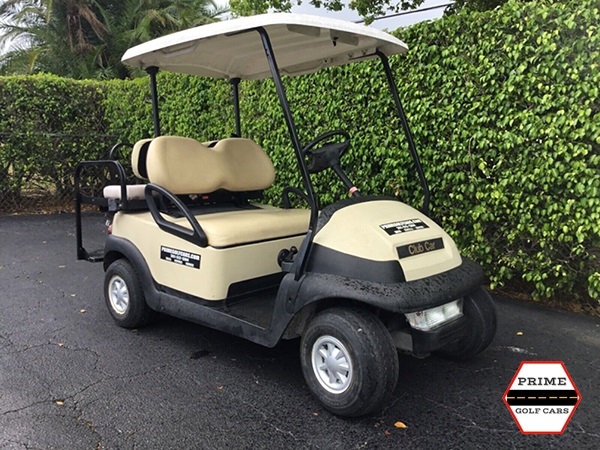 Tan Club Car 4 Passenger Golf Cart