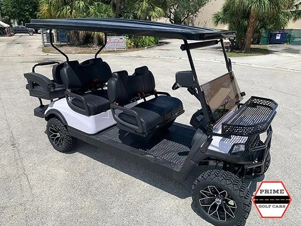 White Aluma 6 Passenger Lifted Golf Cart