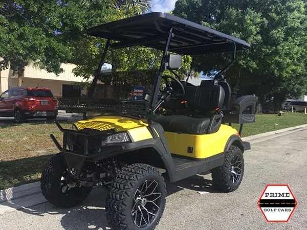 Yellow Aluma 4 Passenger Lifted Golf Cart